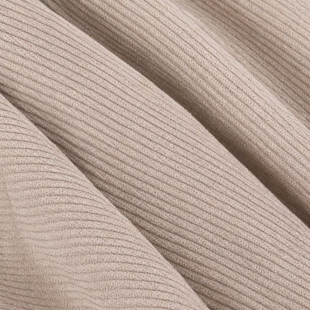 Détail du tissu : velours côtelé beige, reliefs en fines nervures.