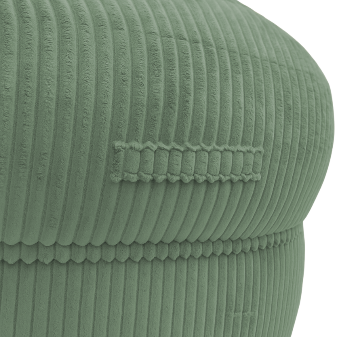 Gros plan sur la poignée du pouf XXL, tissu en velours côtelé.